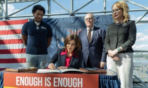 New York Governor Kathy Hochul signing gun safety bill.